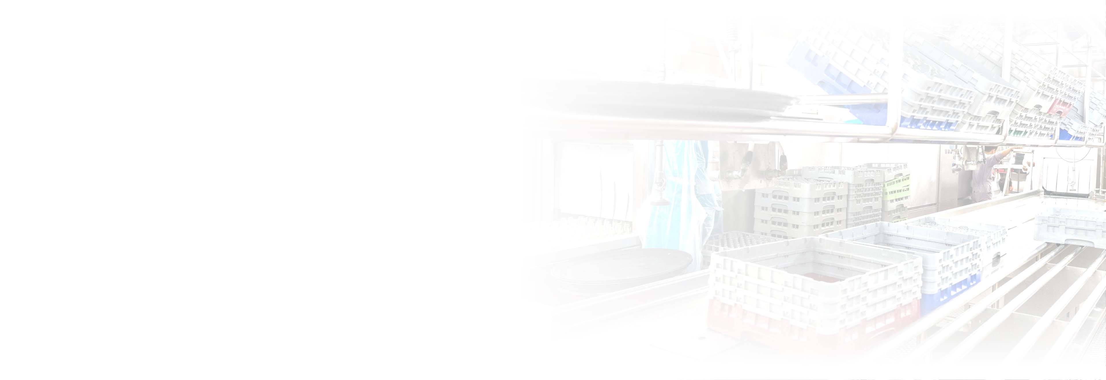 A kitchen interior with dish cleaning racks.